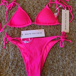 White fox swimsuit in neon pink